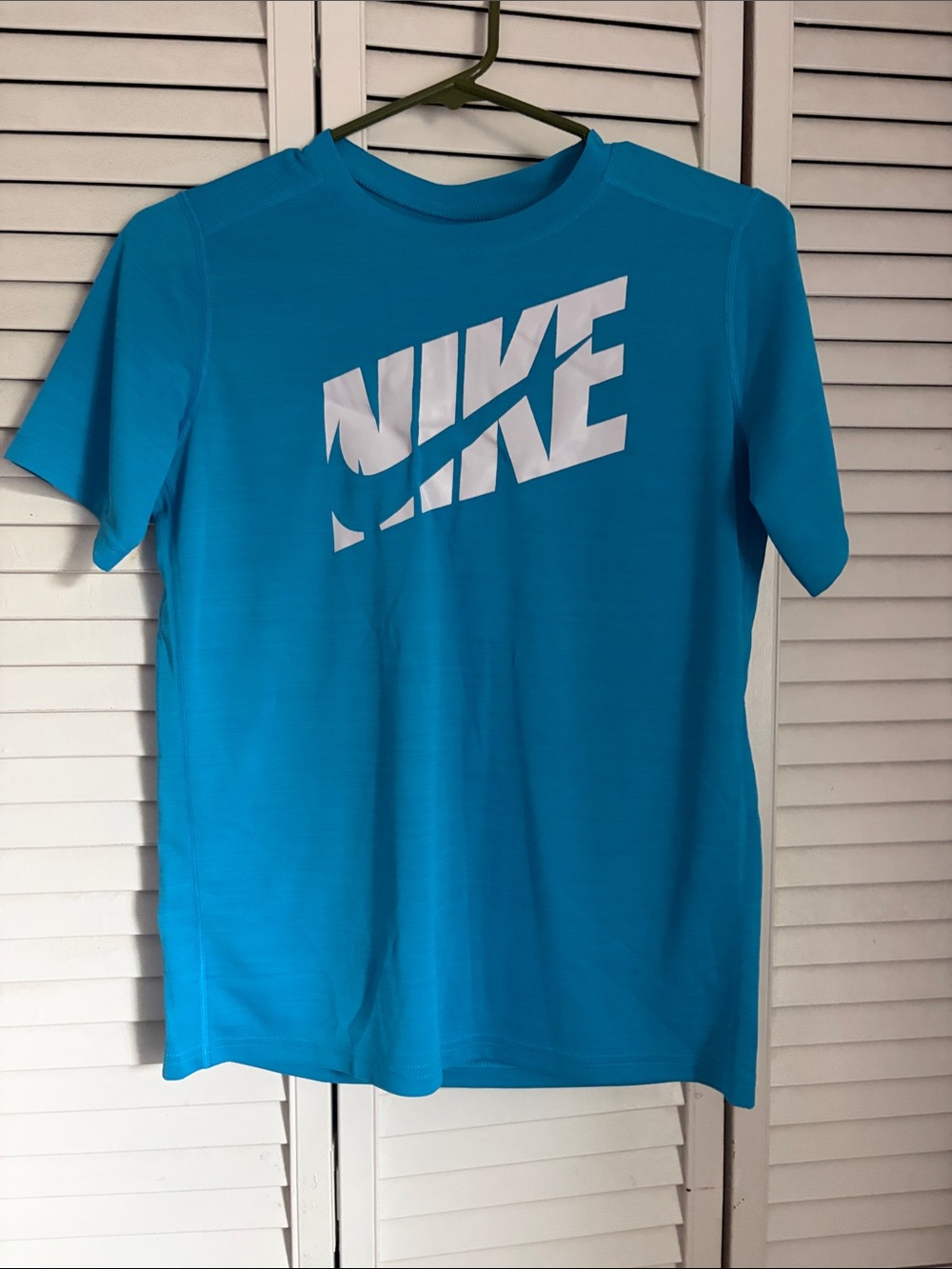 Nike Boys Teal Blue Short Sleeve Shirt with White Logo